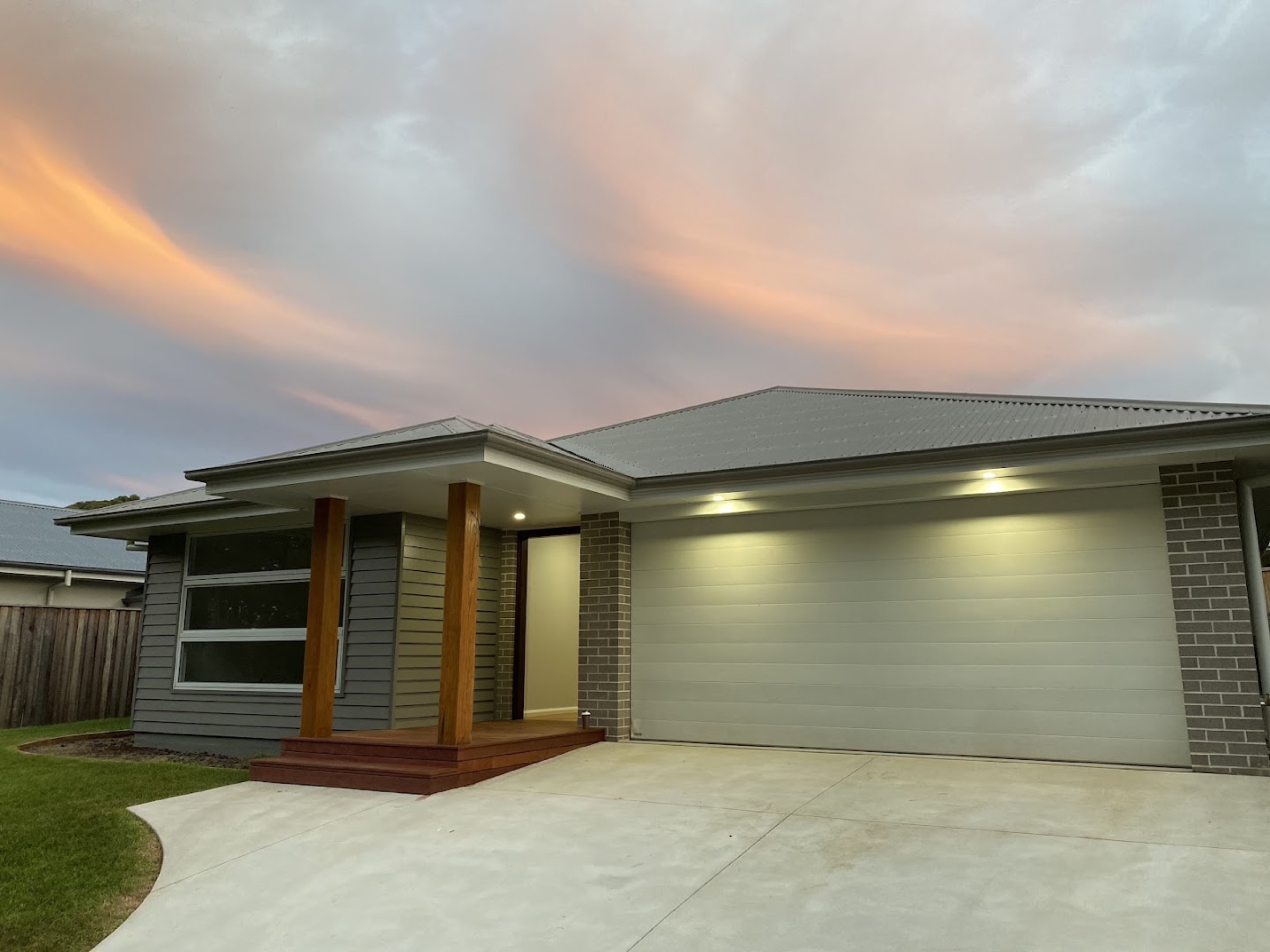 A newly built house exterior in Port Macquarie at dusk