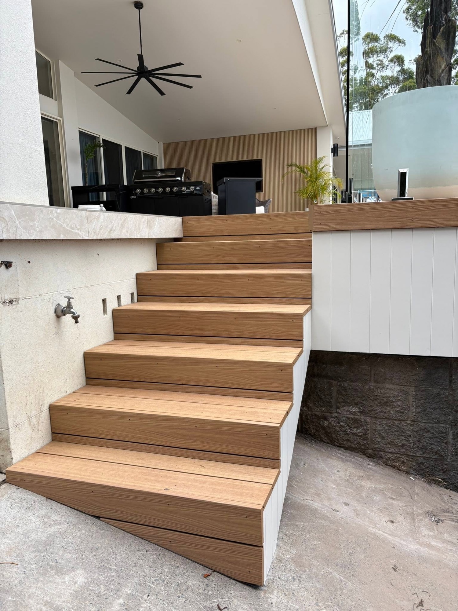 A timber floating staircase inside a Port Macquarie home