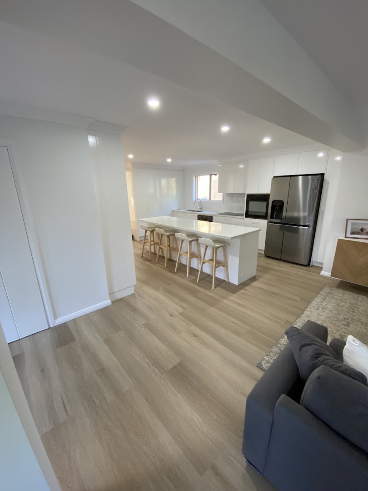 A newly renovated kitchen with an island bench